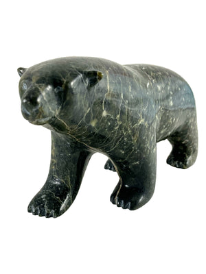 Walking bear by Johnny Saggiatok