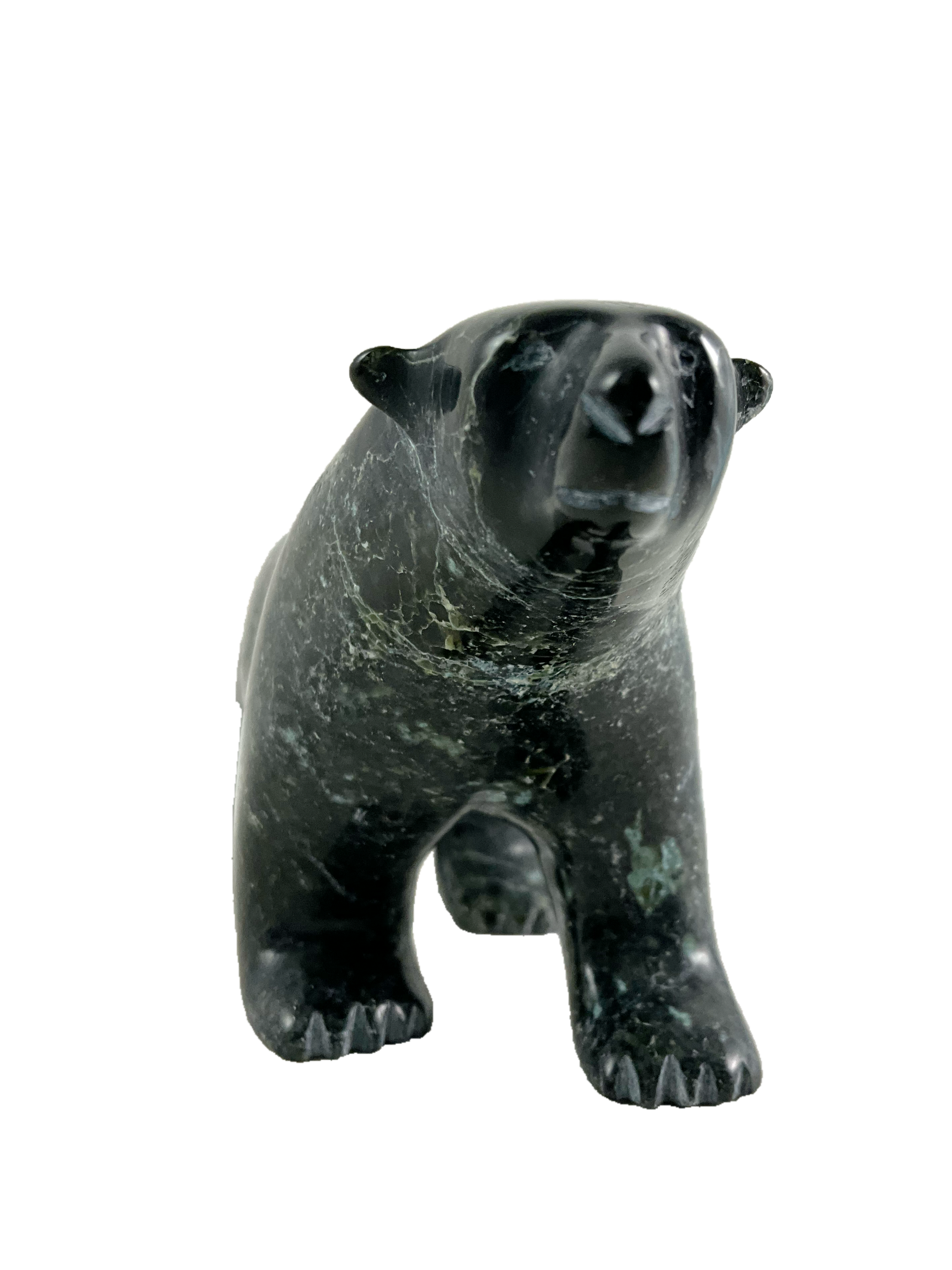 Walking bear by Johnny Saggiatok